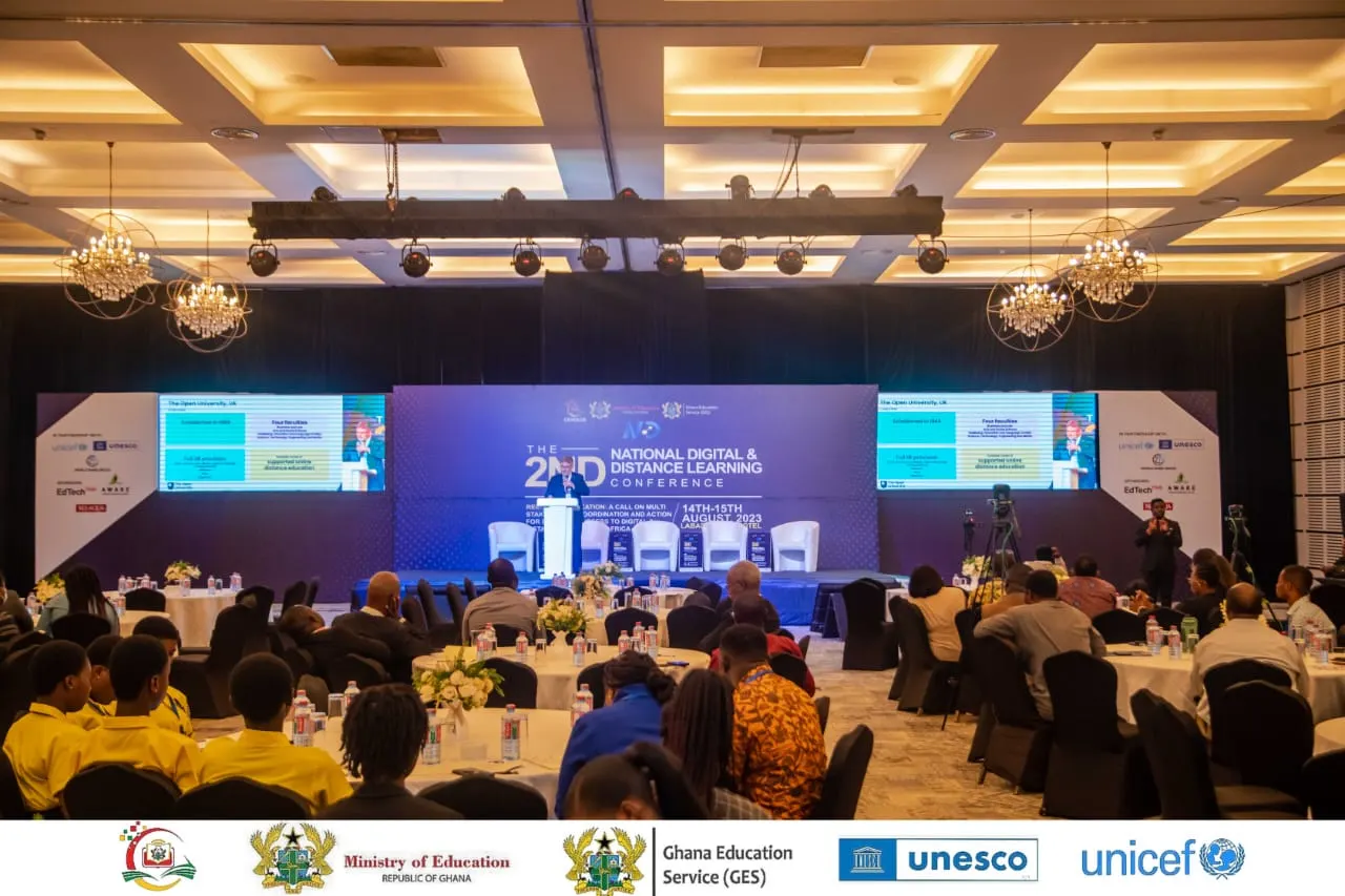 Conference audience facing a large stage at the National Digital and Distance Learning Conference
